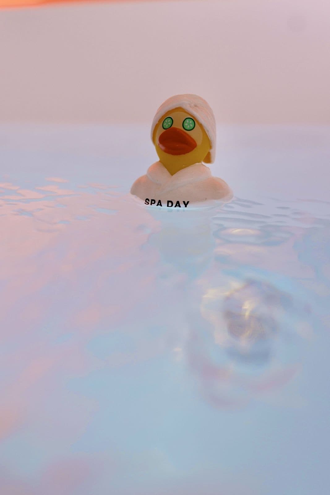 Spa day rubber duck in warm water, date night vibes
