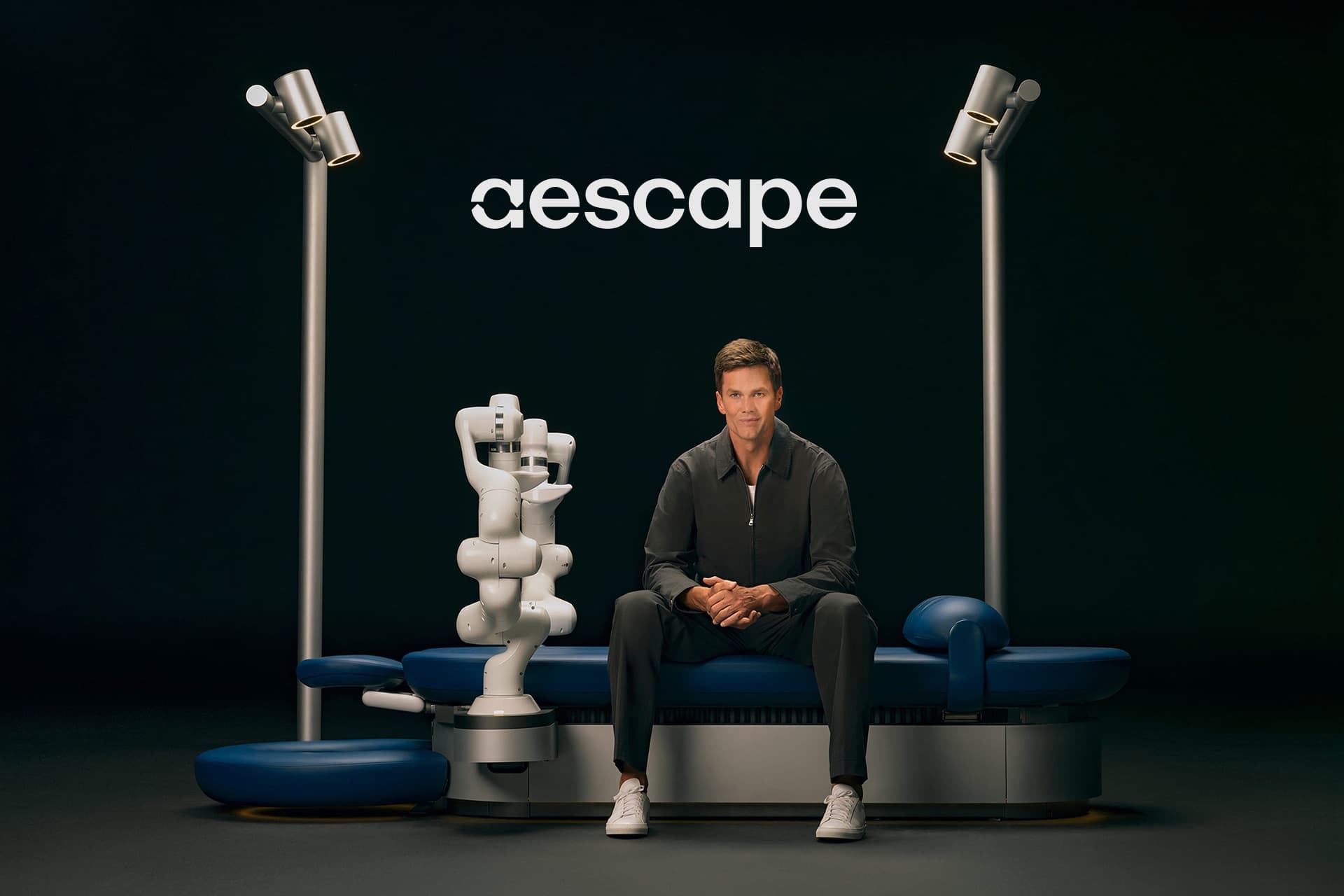 Tom Brady seated on the Aescape table